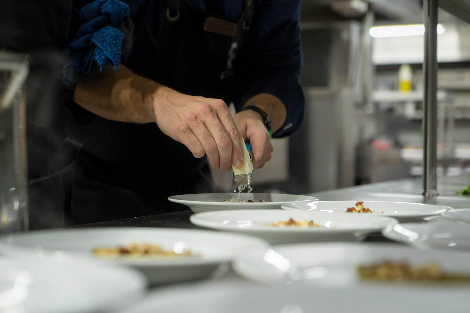 Chef preparing food in a commercial kitchen